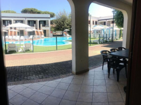 Отель Comfy furnished apartment with AC, near the beach  Лидо Ди Спина
